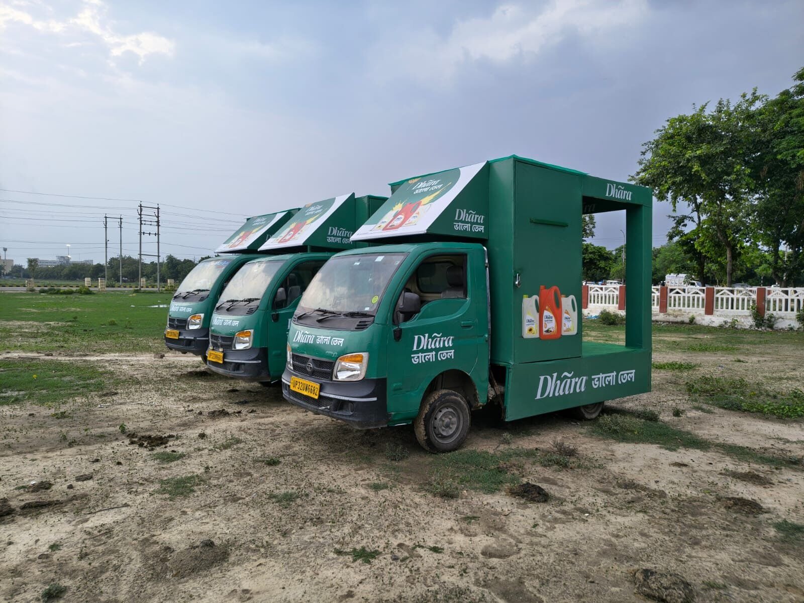 Rudra's branded mobile van fleet lined up on the road