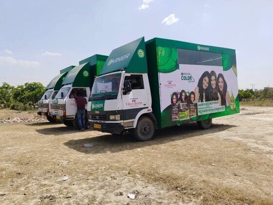 Garnier Color Car branded canter fleet, side view