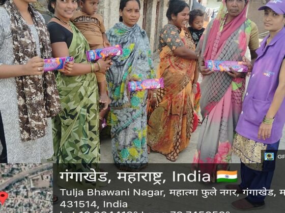 Pro-ease sanitary napkin sampling activation with women at a community gathering in Gangakhed, Maharashtra