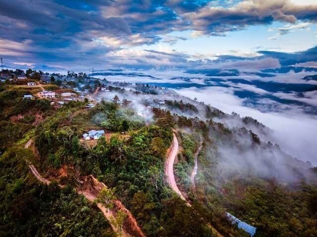 Misty hill town, representing Rudra's East region presence